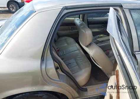 2005 Mercury Grand Marquis из США, поврежденный, VIN 2MHFM75W35X647751